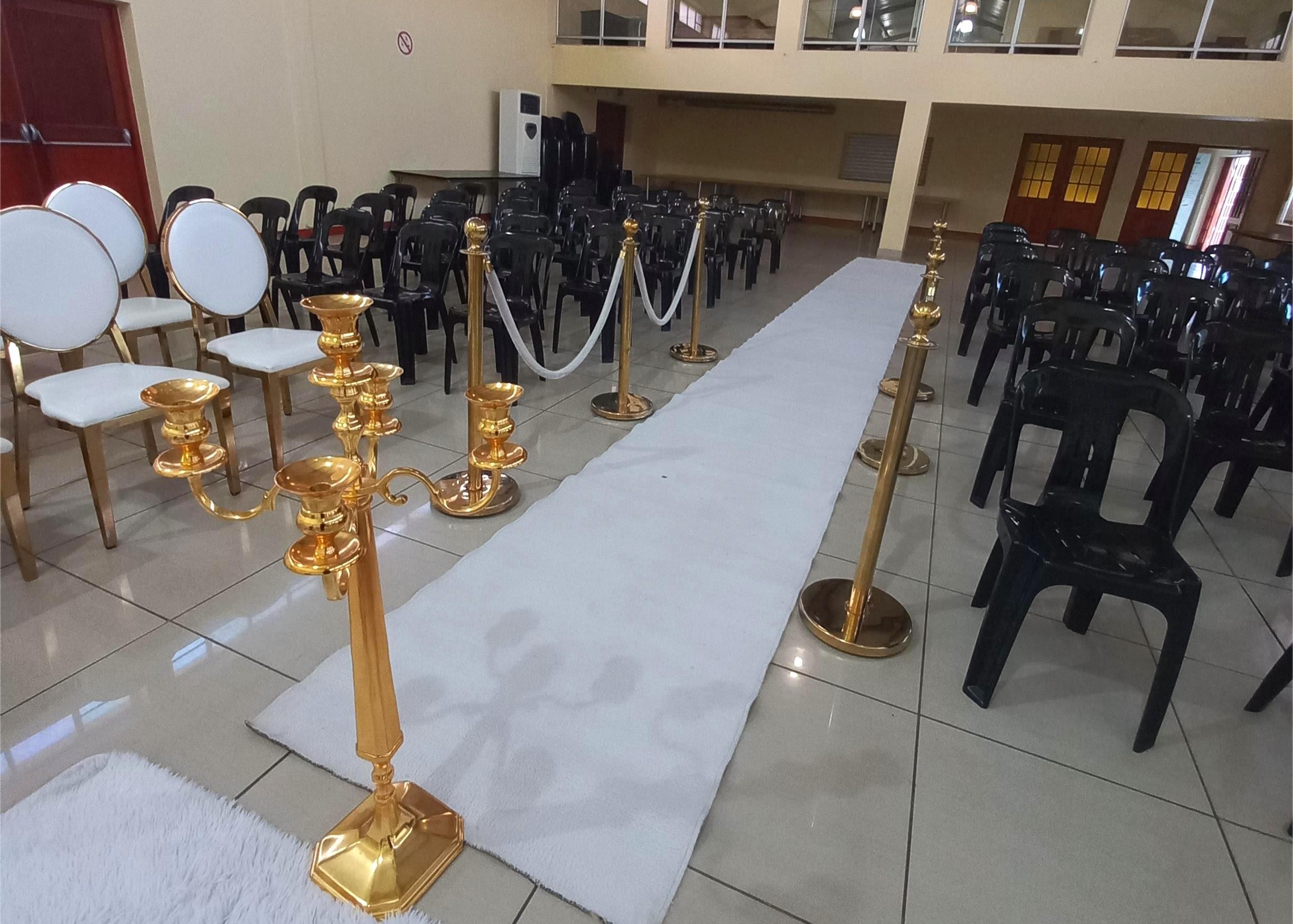 Chairs in the venue with white carpet